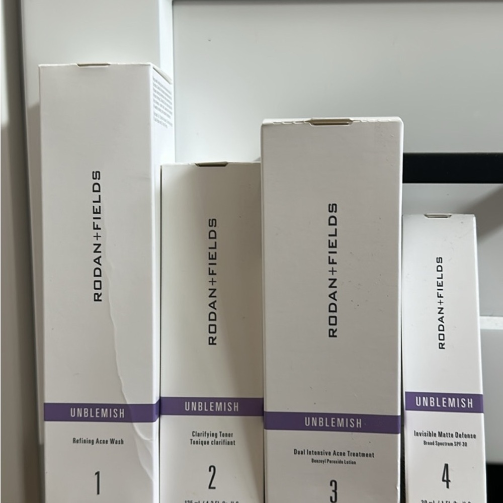 Rodan + Fields Unblemish Skincare Collection - White and Purple
